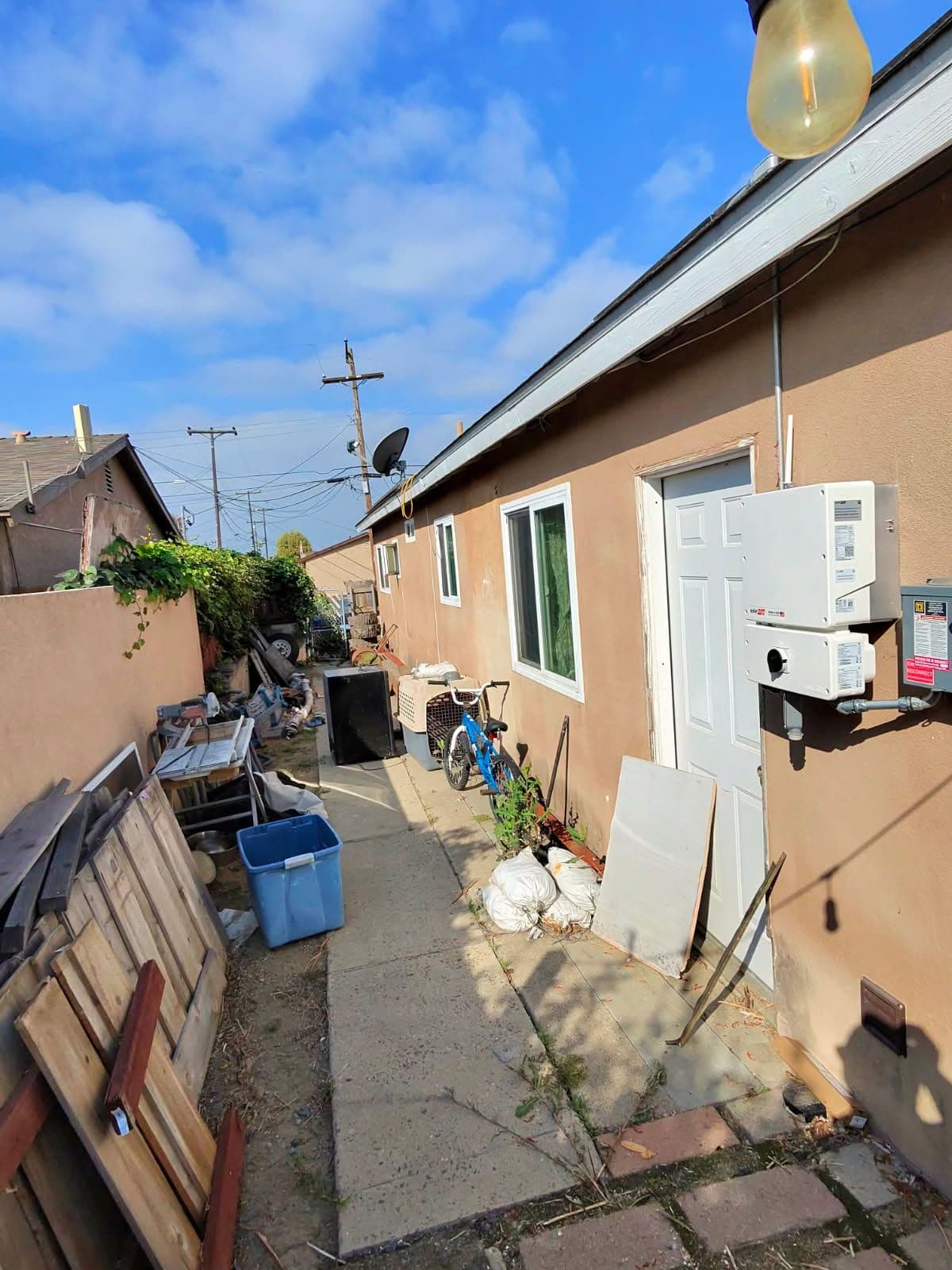 Gallery photos for Transforming a Cluttered Alley into a Clean Path: Image #1